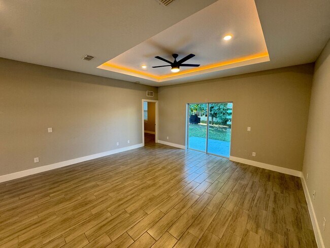 Building Photo - $300 off of a month of rent!! BEAUTIFUL 4 Bedroom, 2 Bathroom BRAND NEW Home in Poinciana!! CABLE...
