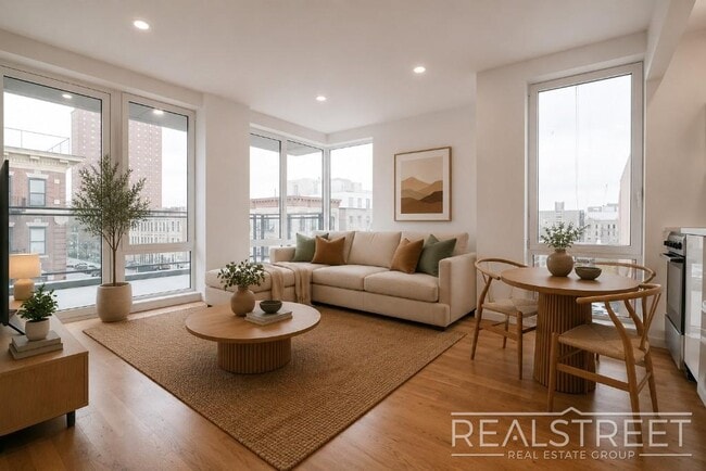 Building Photo - Light-Filled Corner 1BR with Private Outdoor Space & In-Unit Washer/Dryer