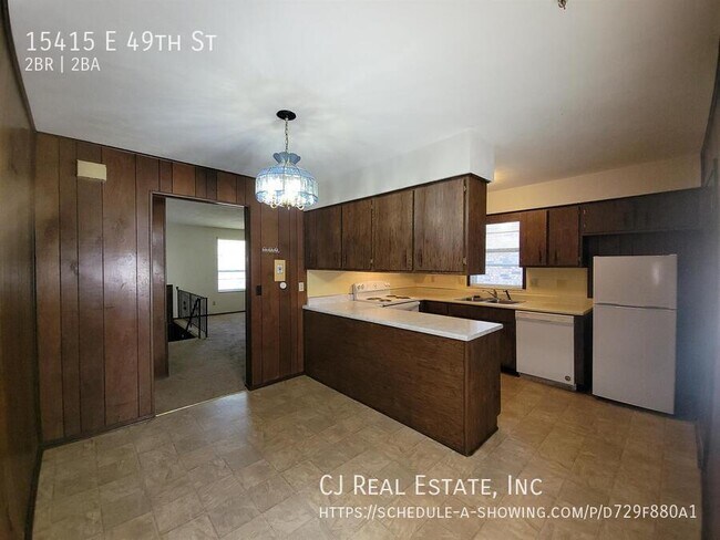 Foto del edificio - 15415 E 49th St