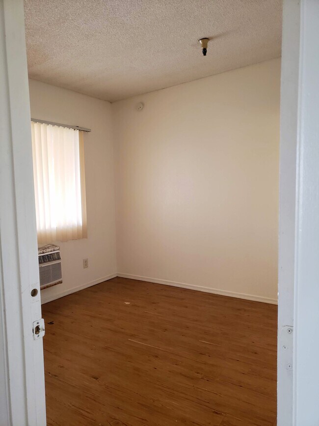 Dormitorio principal - Roger Plaza Apartments