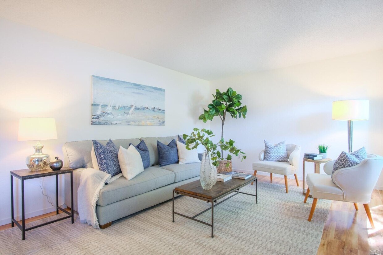 Livingroom with wood look floors - 15 Hector Ln
