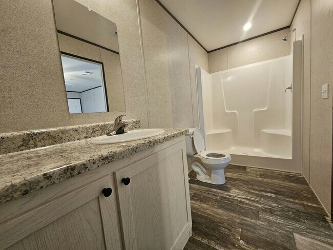 Foto del edificio - 6571 Hidden Oaks Dr