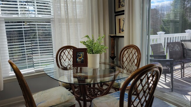 sitting room off of balcony with deck - 33768 Connecticut Ave