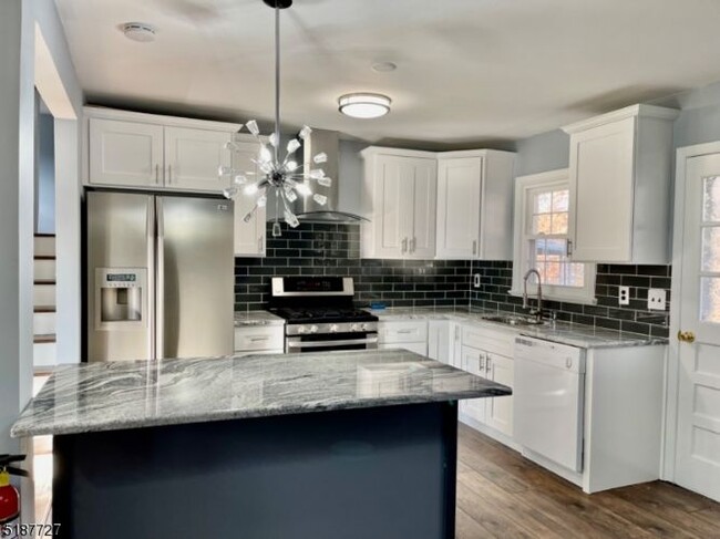 Foto del edificio - 6 Sweetwood Ct