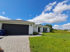 Building Photo - $500.00 Off First Month!!! Beautiful New 3/2 home in Lehigh!!!!