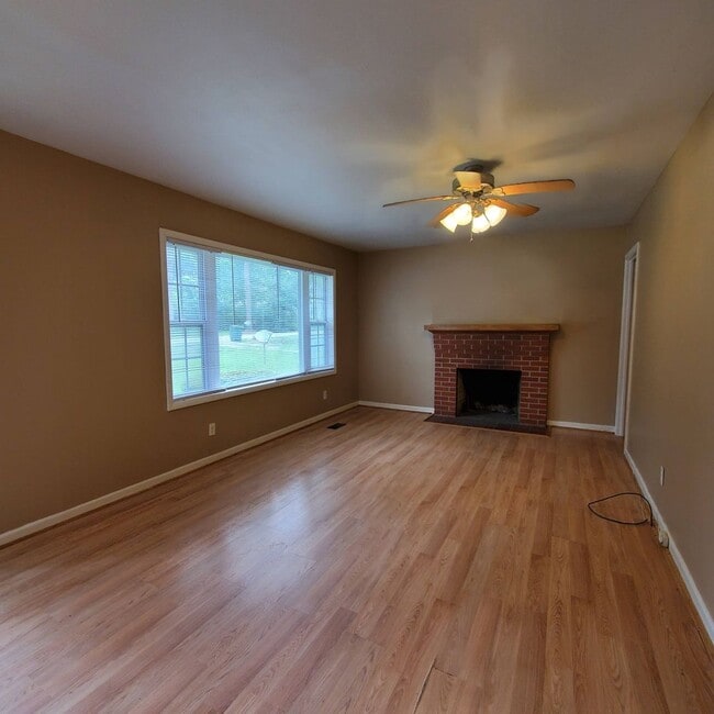 Building Photo - Spacious 3-Bedroom Home with Fireplace, an...