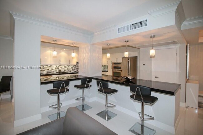 Building Photo - 9801 Collins Ave