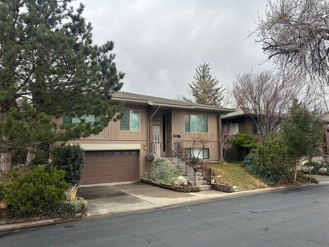 Building Photo - Spacious Millcreek Townhome with Two Living Areas, Private Deck & Community Amenities