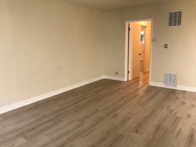 Living Room - new wood floor - 325 S Doheny Dr