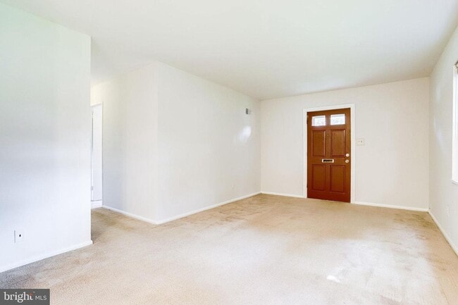 Building Photo - Expanded Pimmit Hills Rambler with Family ...