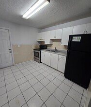 Building Photo - 5880 NW 19th Ct