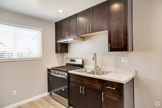 2BR, 1BA - 847SF - Kitchen - Village Apartments