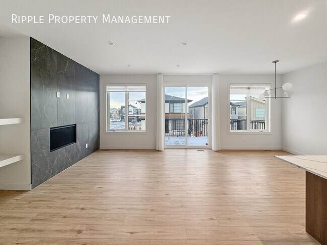 Photo du bâtiment - BRAND NEW 4 BEDS, 3.5 BATHS TOWNHOUSE | COMMUNITY OF COUGAR RIDGE