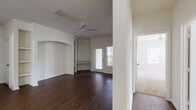 This single-story home presents a thoughtfully designed open layout with a neutral color palette throughout. The main living area is a standout feature, showcasing rich, dark hardwood flooring that extends through the primary spaces, complemented by crown molding and a ceiling fan with a light fixture overhead. A decorative arched alcove with built-in shelving adds architectural character to the living room, while a built-in bench near the back door provides functional detail. Natural light enters through a glass-paneled back door and an adjacent window, enhancing the bright, airy atmosphere.

The dining area connects seamlessly to the living space and is accented by a pendant light fixture, with tile flooring marking the transition near the entryway. The kitchen is galley-style, featuring warm wood cabinetry, dark countertops, a tile backsplash, tile flooring, and white appliances including a range, microwave, refrigerator, and dishwasher. A breakfast bar provides an open pass-through to the living and dining areas.

The bathroom includes a full tub-shower combination with white tile surround. A spacious walk-in closet with wire shelving and carpet flooring offers generous storage. The home provides a clean, functional living environment throughout.