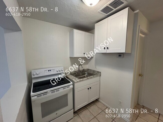 Foto del edificio - 6637 N 58th Dr
