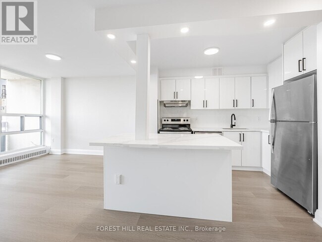 Photo du bâtiment - 140-1140 Elm Ridge Dr