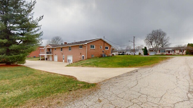 Building Photo - Madison School's- 2 Bedroom Brick Ranch with Garage!