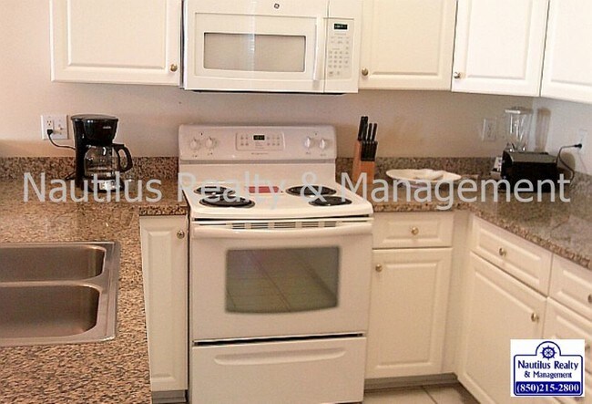 Foto del edificio - 10519 Front Beach Rd