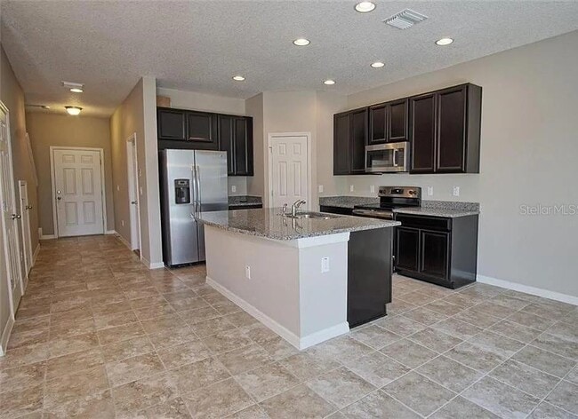 Foto del edificio - 7026 Woodchase Glen Dr