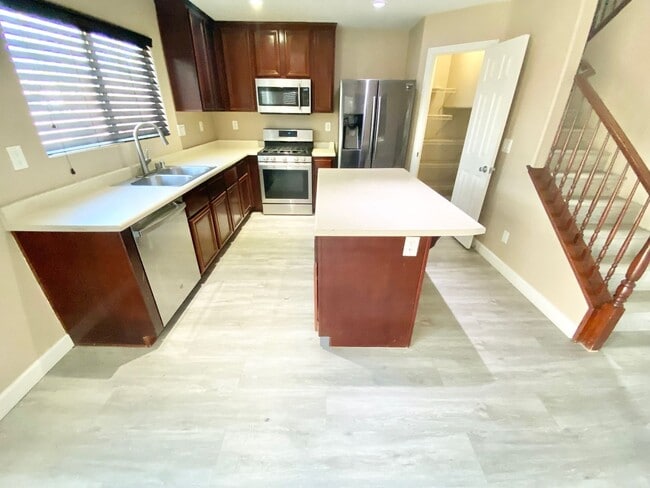 Building Photo - STUNNING 2 STORY HOME 3 BEDROOM 2.5 BATH W/ ONE CAR GARAGE IN A GATED COMMUNITY!