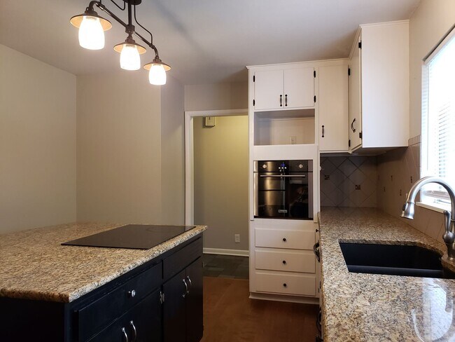 Building Photo - 4 bed / 1 bath 2 car garage home available...