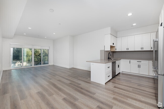 3BR, 2BA - 1,320SF - Living Room - 857 N Hayworth Ave