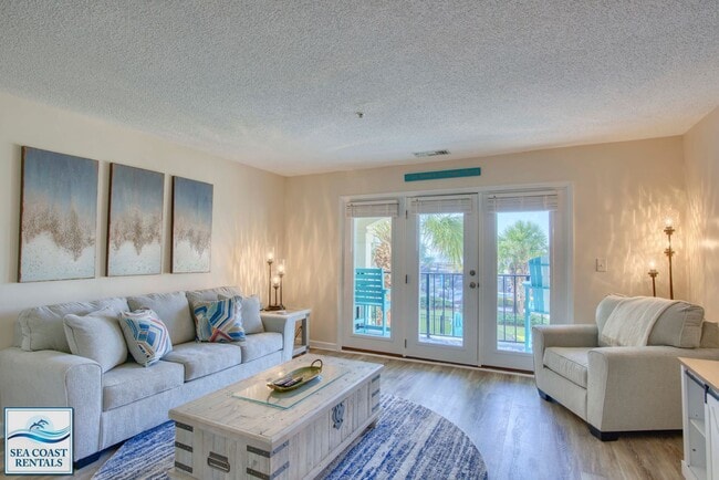 Foto del edificio - FULLY FURNISHED OFF-SEASON RENTAL AVAILABLE NOW THROUGH MID-MAY