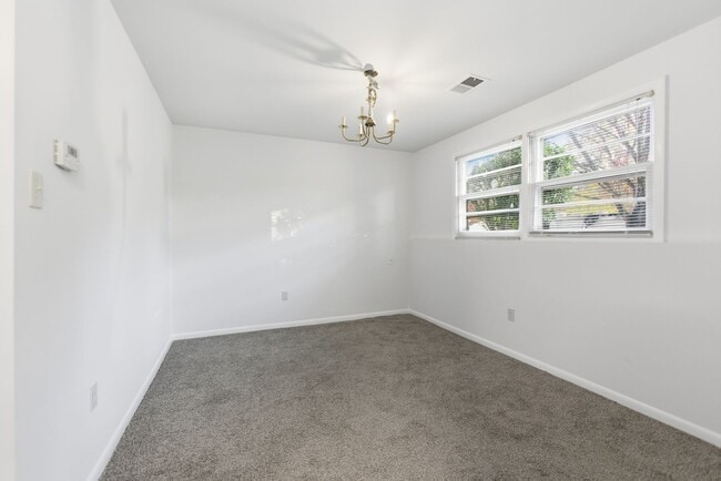 Building Photo - Charming 3 BR/2.5 BA Single-Family Home in...