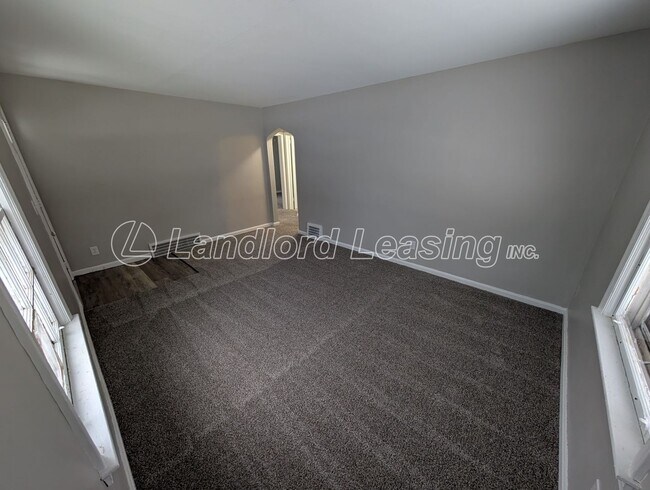 Building Photo - Well-Maintained Cape Cod with Garage on Corner Lot