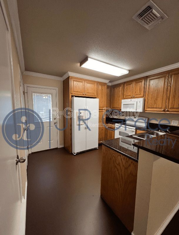 Foto del edificio - 740 Rocky Ridge Flatts