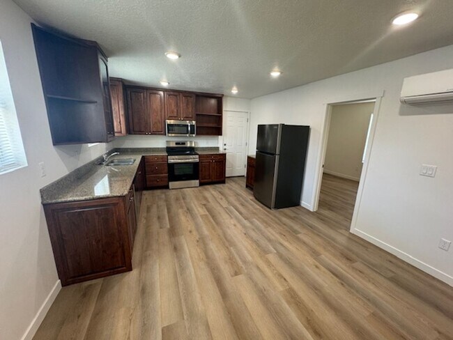 Building Photo - BRAND NEW!!  Utilities included**