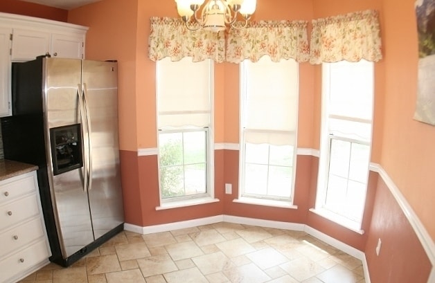 Building Photo - Brick 3 Bedroom Home! Stunning Backyard! M...