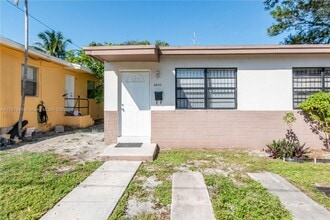 Building Photo - 6030 NW 8th Ave