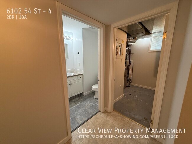 Photo du bâtiment - Recently renovated two-bedroom, one-bathroom suite with UTILITIES INCLUDED in Taber!!