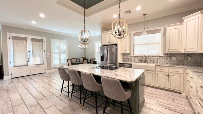Building Photo - A Modern 3BR Home: Stylish, Patio with Com...