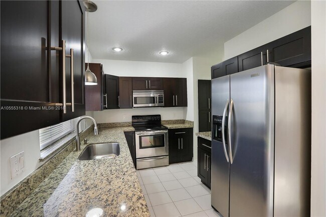 Building Photo - 7722 Hibiscus Ln