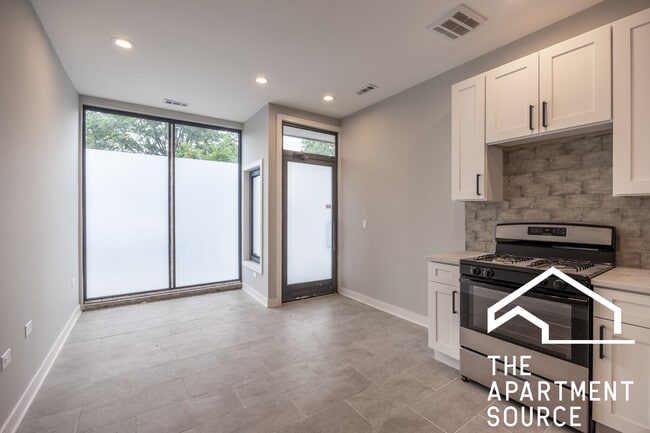 Foto del edificio - 5422 W Belmont Ave