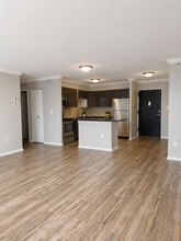 2BR, 1BA - 832SF - Living room into kitchen - 360 Main