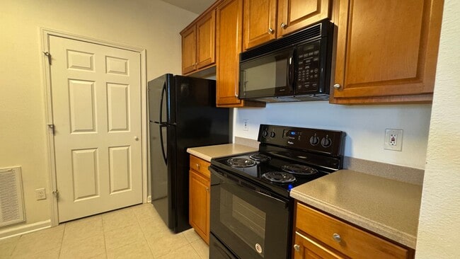 Building Photo - 2BR 4th Floor Condo Near St. Johns Town Center. Gated Community. Balcony & Elevator Access!