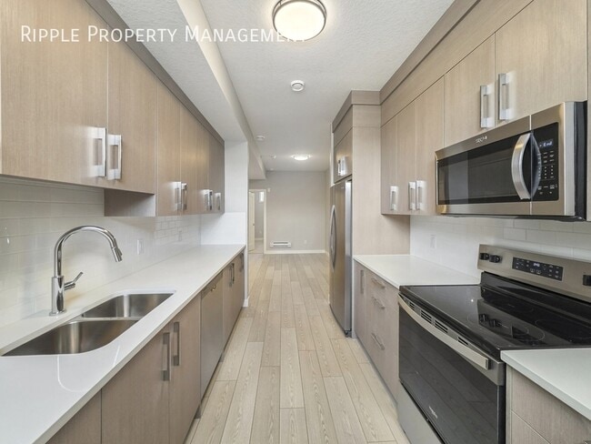 Building Photo - MODERN & COZY 1-BED, 1-BATH BASEMENT SUITE | PRIVATE ENTRY & IN-SUITE LAUNDRY