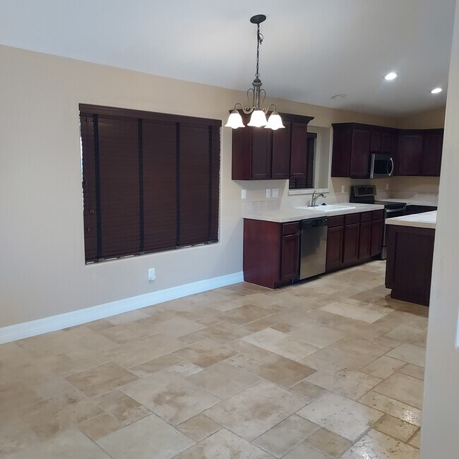 Building Photo - 9447 E Olla Ave