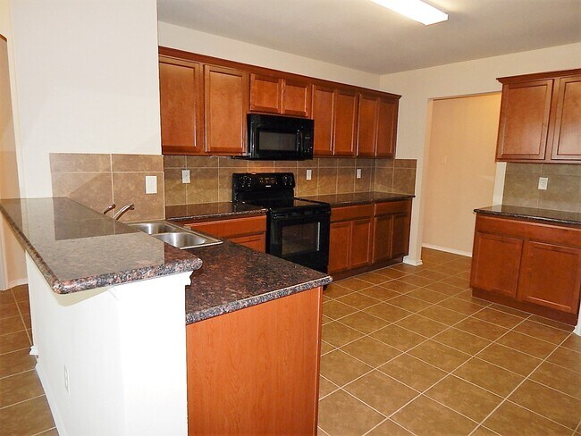 Foto del edificio - 1217 River Oak Ln