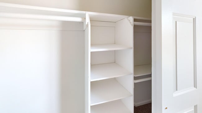 Thoughtful touches like custom wood shelving add both charm and function throughout your home. - Greenfield Crossing