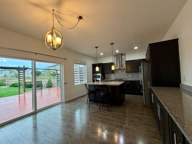 Photo - ~September Rent Free~ Gorgeous three Bedroom Home in Reunion with Private Office, Loft & Chef’s K...