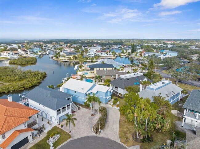 Foto del edificio - Waterfront Living in a 4-Bed, 3-Bath Oasis at 6029a Bayway Court, New Port Richey!
