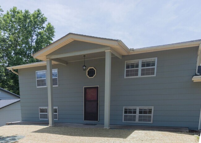 Building Photo - Charming 3BR Home-Screened Porch, Private Garage & Massive Backyard