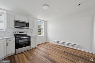 Building Photo - 6123 Glenmore Ave