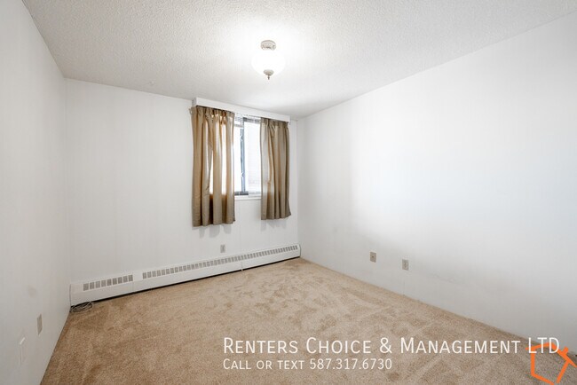 Photo du bâtiment - Downtown Condo Complex with Gym, Elevator & Parkade