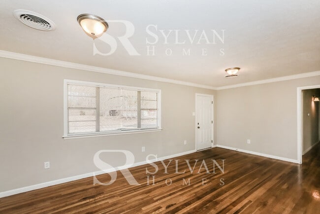 Photo - The living is easy in this 3 bedroom, 2 ba... House