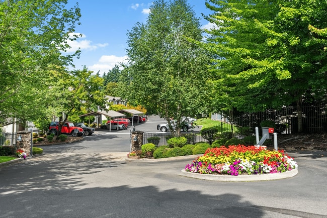 A welcoming entrance with beautiful landscaping, creating a warm arrival home. - Terrace on Meridian